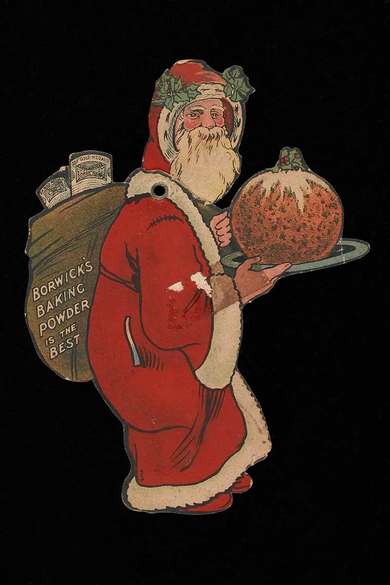 Father Christmas Santa Clause carrying a Christmas pudding