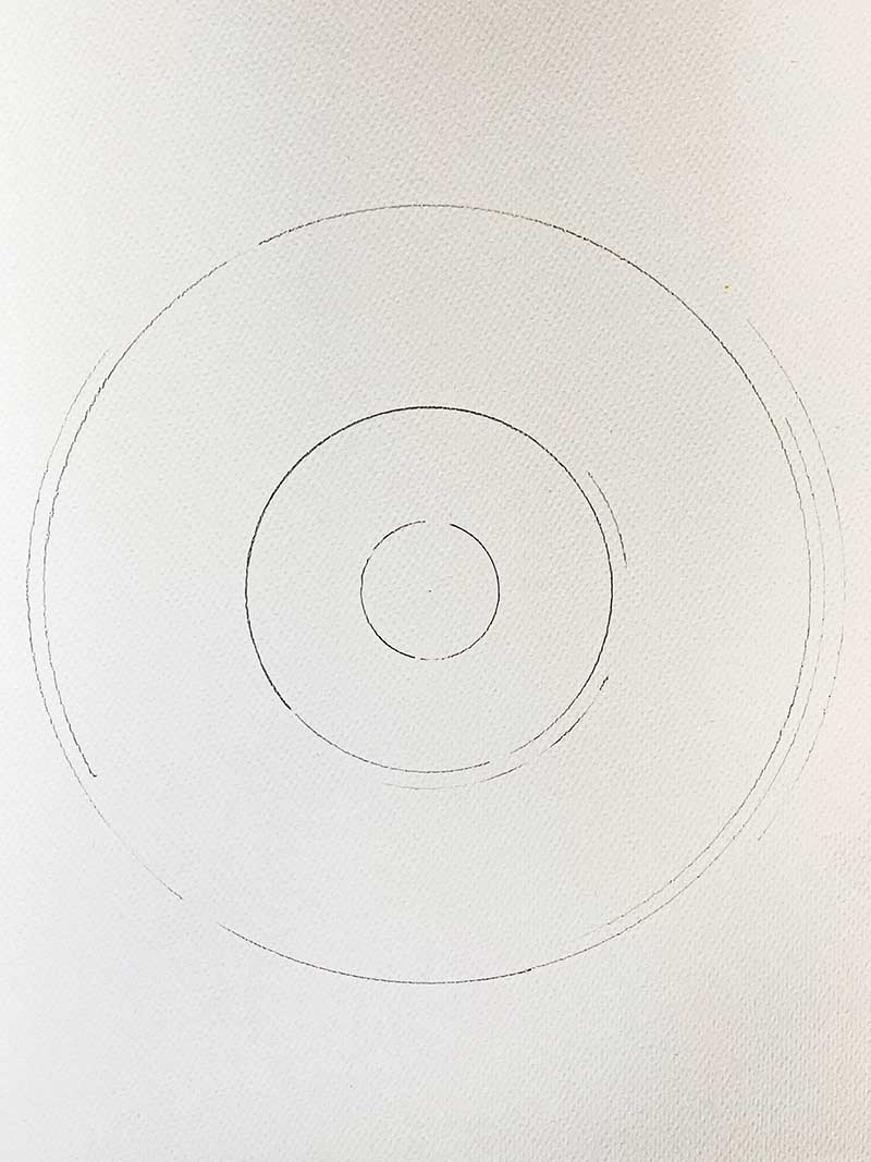  3 concentric circles in pencil on white paper