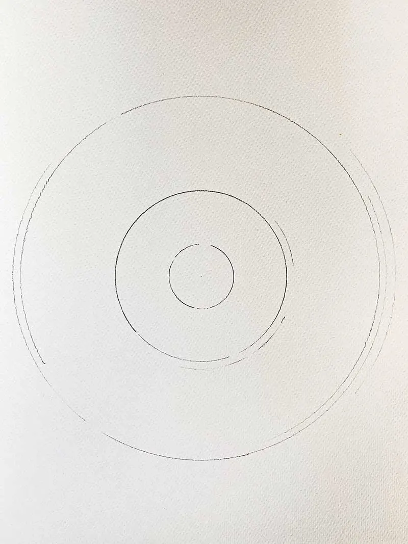  3 concentric circles in pencil on white paper