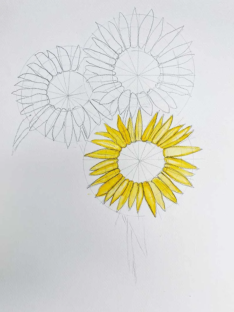 painting the petals on a bunch of three tiger sunflowers